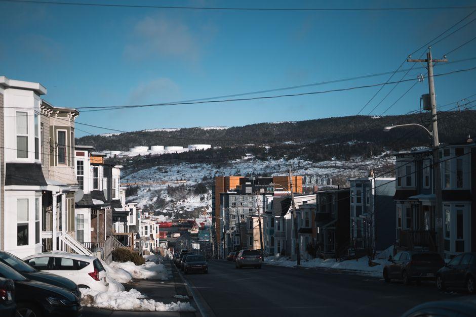 Power Lines Hanging over a Town Road in Winter