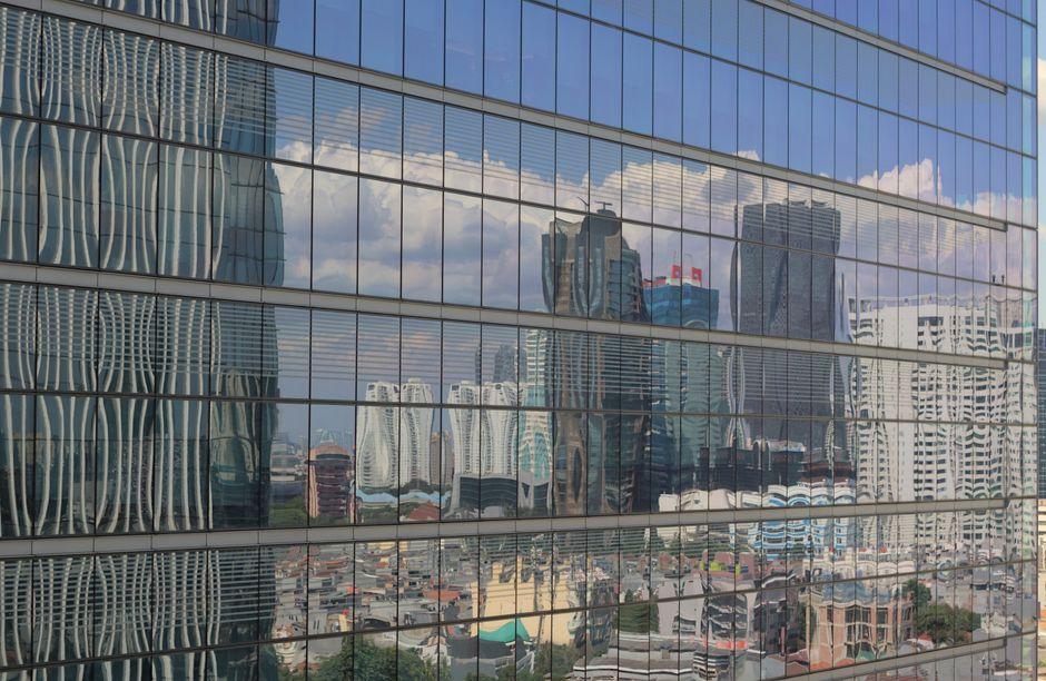 Reflection of Downtown in Glass Skyscraper