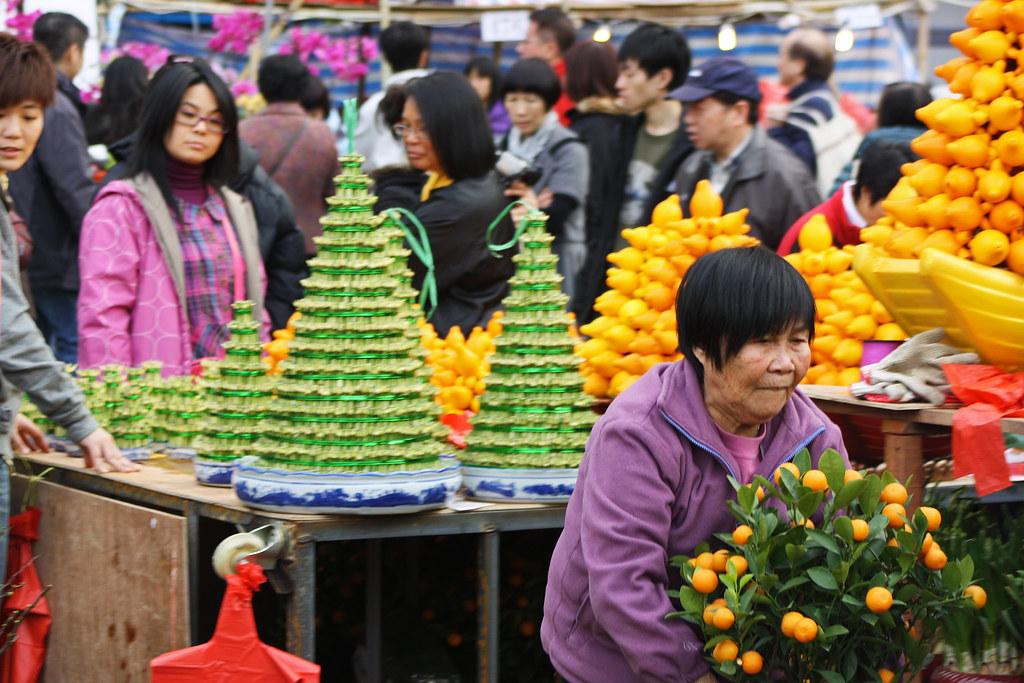 Causeway Bay leads urban sustainability with rooftop gardens and waste programs.